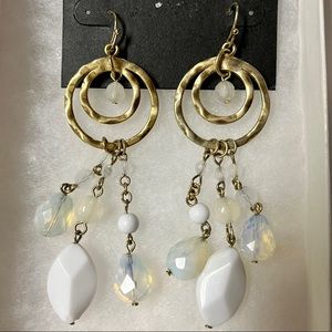 Bebe dangle earrings. Gold plated and white. Great condition with box!